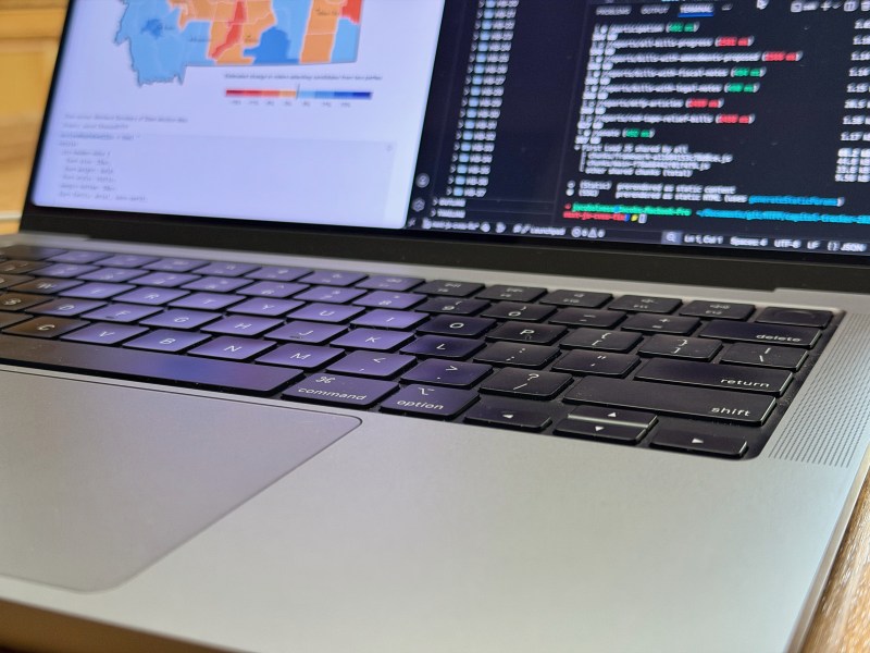 Laptop with data analysis on screen